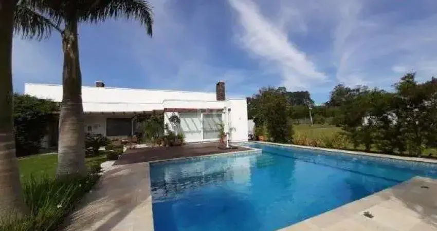Casa Condominio em Porto Alegre, no bairro Belém Novo, com 3 dormitório(s), e 3 banheiros, à venda.