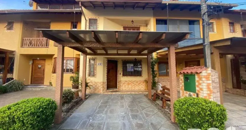 Casa com 3 quartos à venda na Avenida Edgar Pires de Castro, 1375, Hípica, Porto Alegre