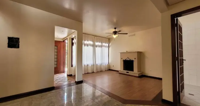 Casa com 4 quartos à venda na Rua Tupanciretã, 93, Passo da Areia, Porto Alegre