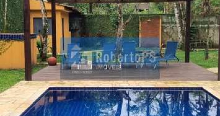 Espetacular Casa à Venda em Camburi, São Sebastião-SP: 4 quartos, 4 suítes, sauna, piscina e mais! Venha conhecer!