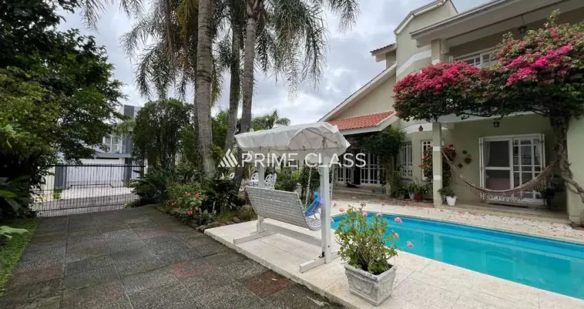 Casa com 5 quartos à venda na Rua País de Gales, 41, Moinhos De Vento, Canoas