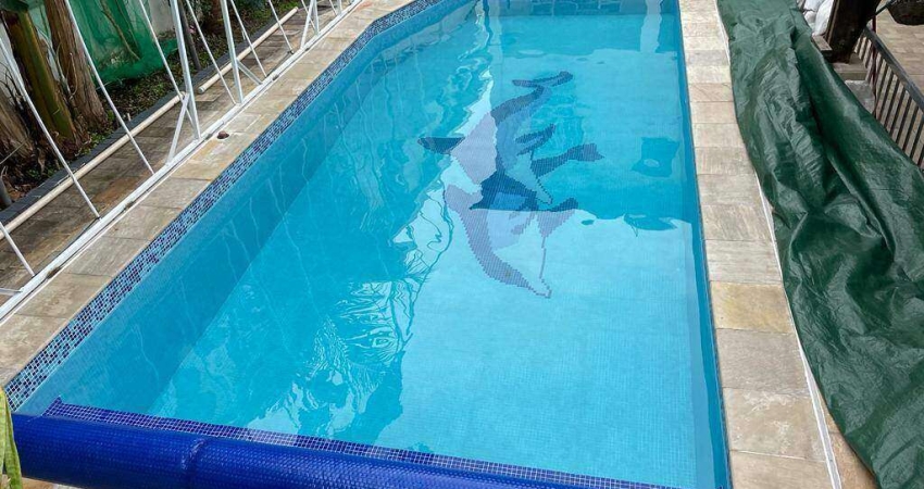 CASA 4 DORMITÓRIOS 3 SUÍTES 6 VAGAS DE GARAGEM PISCINA AQUECIDA QUINTAL