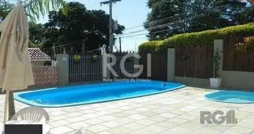 Casa em condomínio fechado com 3 quartos à venda na Rua Humberto de Campos, 601, Partenon, Porto Alegre