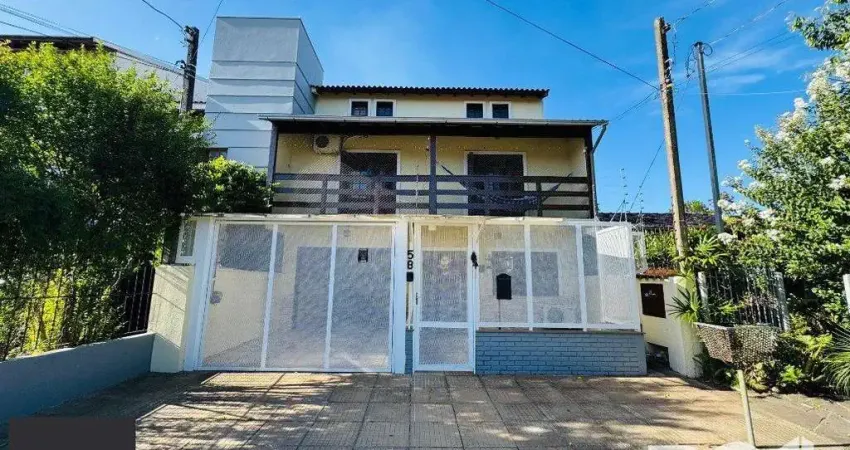 Casa com 4 quartos à venda na Rua Hermínio Bittencourt, 58, Hípica, Porto Alegre