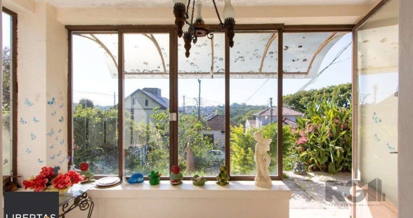 Casa com 2 quartos à venda na Rua Oscar Tollens, 242, Santa Tereza, Porto Alegre