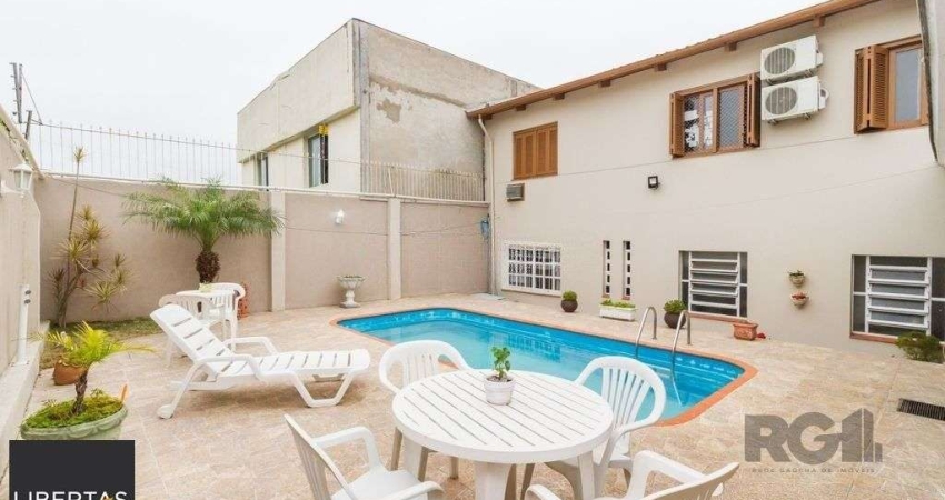 Casa com 4 quartos à venda na Avenida da Serraria, 742, Espírito Santo, Porto Alegre