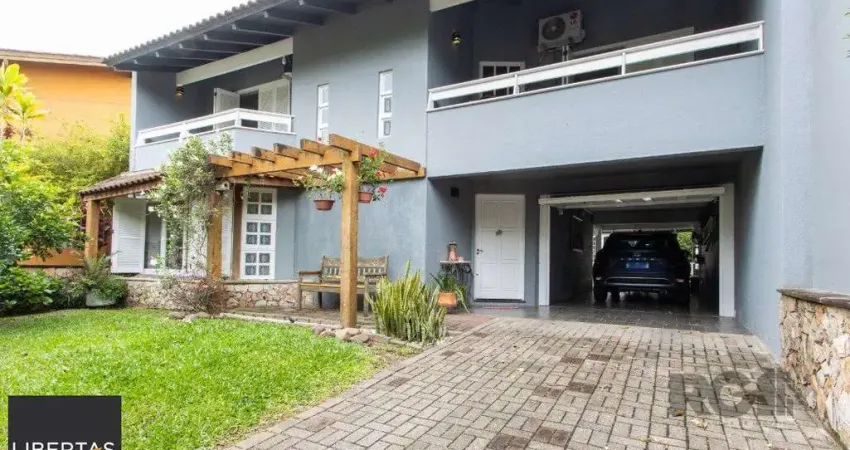 Casa com 4 quartos à venda na Rua Adão Pinheiro da Silva, 565, Ipanema, Porto Alegre