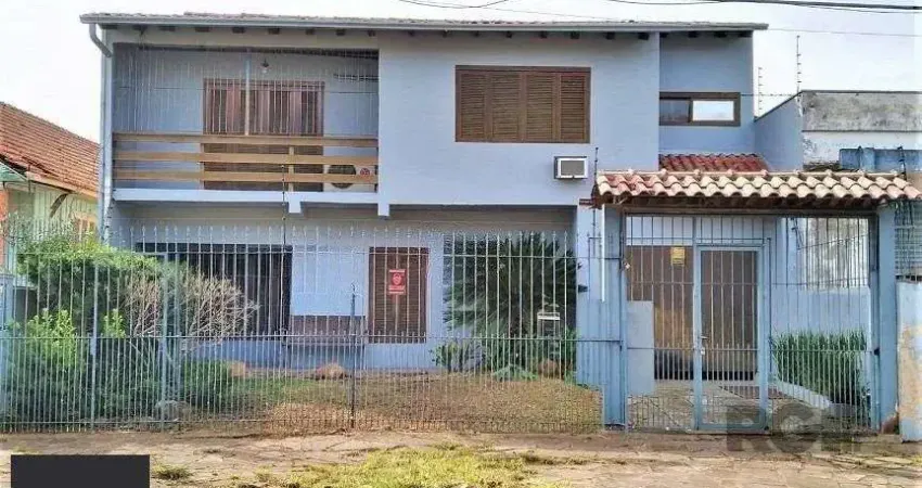 Casa com 3 quartos à venda na Rua Vítor Valpírio, 489, Anchieta, Porto Alegre