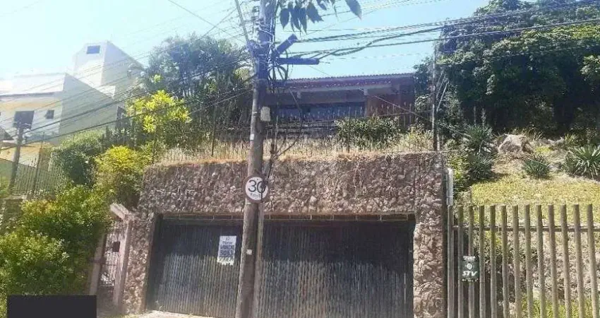 Casa com 5 quartos à venda na Rua Alcebíades Antônio dos Santos, 260, Nonoai, Porto Alegre