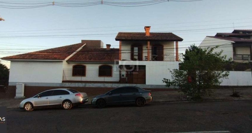 Casa com 4 quartos à venda na Avenida Delmar Rocha Barbosa, 792, Parque Santa Fé, Porto Alegre
