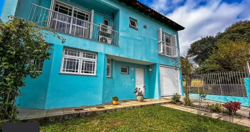 Casa 4 dormitórios à venda Vila Nova Porto Alegre/RS