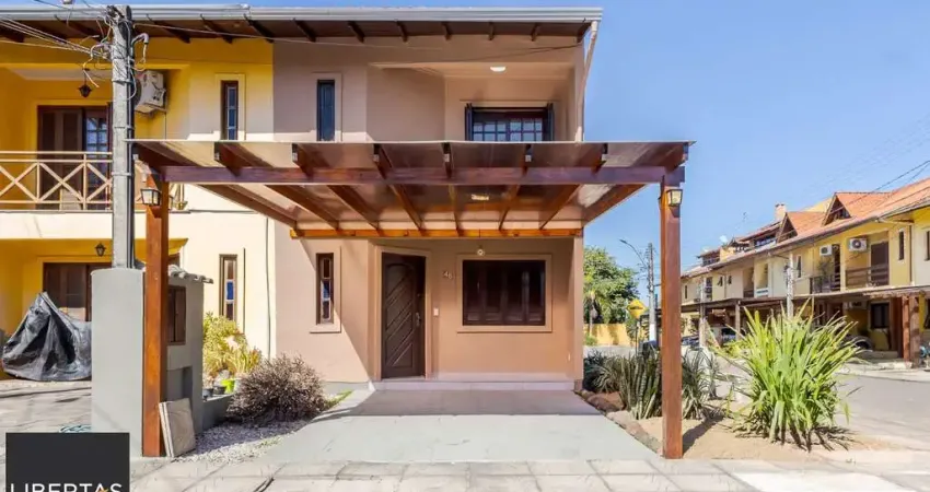 Casa em condomínio fechado com 3 quartos à venda na Avenida Edgar Pires de Castro, 1286, Hípica, Porto Alegre