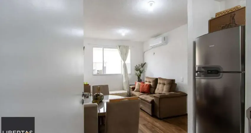 Charmoso apartamento semimobiliado de 2 dormitórios e 1 vaga de garagem no bairr