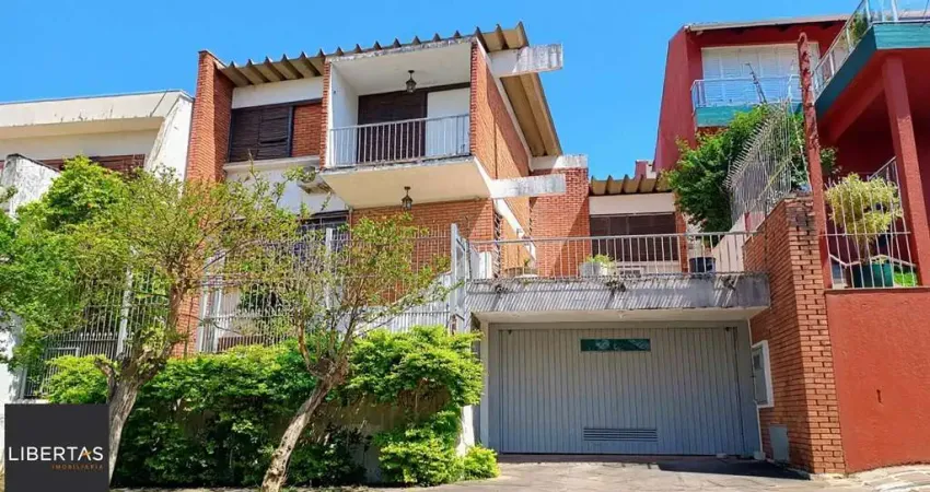 Casa com 3 quartos à venda na Rua Teixeira de Carvalho, 197, Medianeira, Porto Alegre