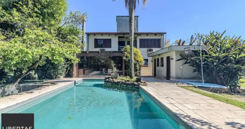 Casa com 4 quartos à venda na Rua Engenheiro Tito Marques Fernandes, 339, Ipanema, Porto Alegre