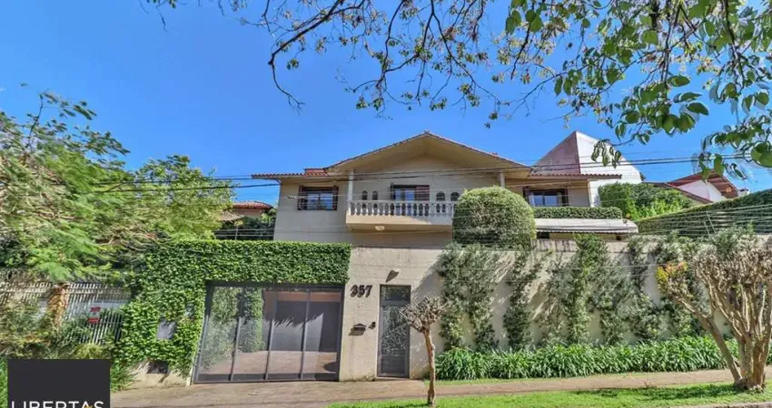 Casa com 4 quartos à venda na Rua Felipe Becker, 357, Três Figueiras, Porto Alegre