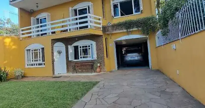 Casa com 4 quartos à venda na Rua buttenbender,56, --, Fátima, Canoas