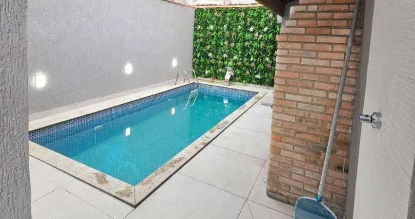 Excelente casa geminada à venda no bairro Nova Mirim, Praia Grande/SP