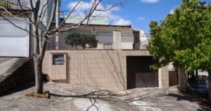 Casa com 4 quartos à venda na Rua Tijuca, Medianeira, Porto Alegre