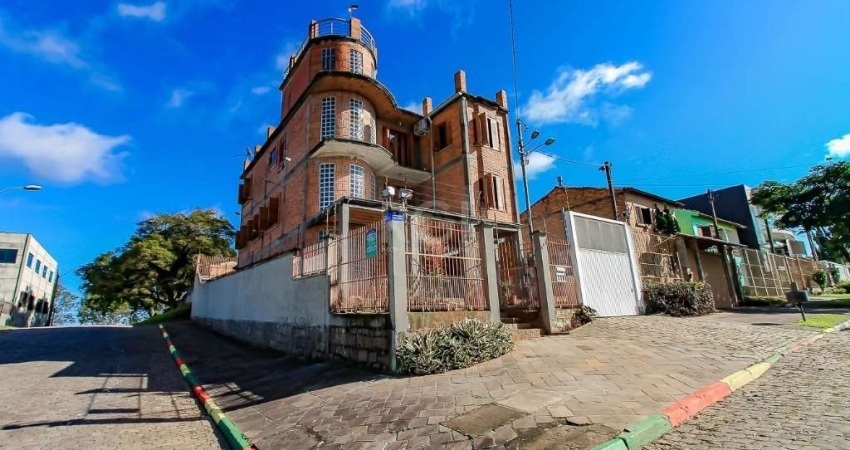 Casa com 5 quartos à venda na Rua Professora Ziláh Totta, Jardim Leopoldina, Porto Alegre