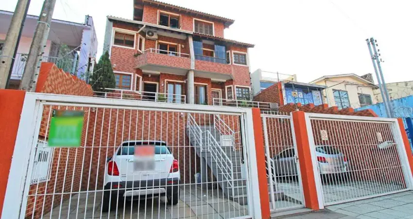 Casa com 4 quartos à venda na Avenida Coronel Gastão Haslocher Mazeron, 479, Medianeira, Porto Alegre