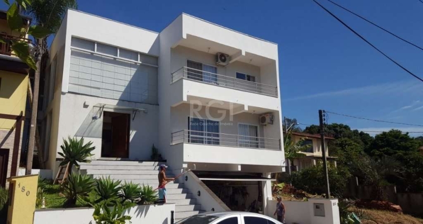Casa em condomínio fechado com 3 quartos à venda na Rua Cangerana, São Lucas, Viamão
