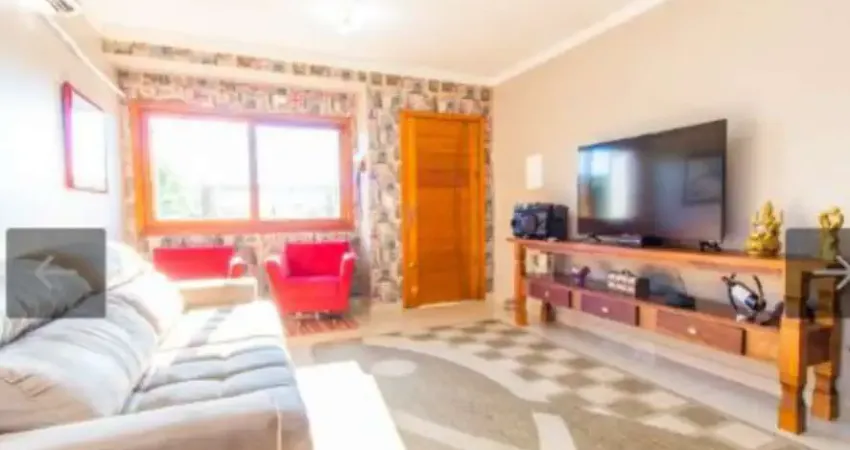 Casa com 3 quartos à venda na Rua Waldemar da Silva Tavares, Guarujá, Porto Alegre