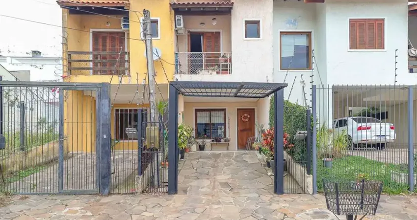 Casa com 2 quartos à venda na Rua Giobatta Giuseppe Petracco, 237, Vila Nova, Porto Alegre