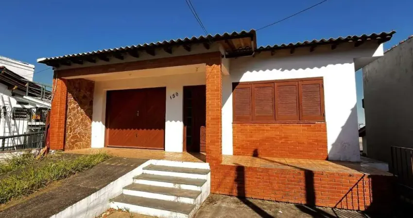 Casa com 5 quartos à venda na Rua Glênio Peres, 130, Vila Nova, Porto Alegre