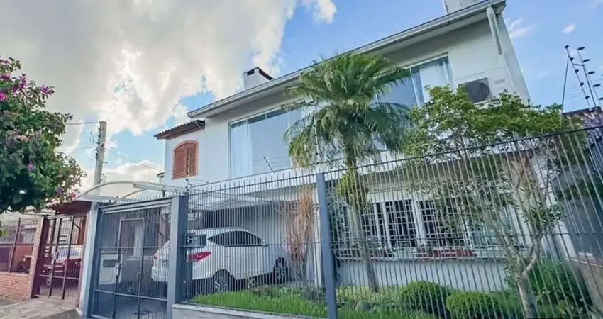 Casa com 4 quartos à venda na Rua Pedro Waine, 194, Santa Maria Goretti, Porto Alegre