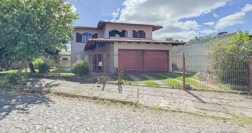 Casa com 5 quartos à venda na Rua Vicente Celestino, 430, Parque Dos Maias, Porto Alegre