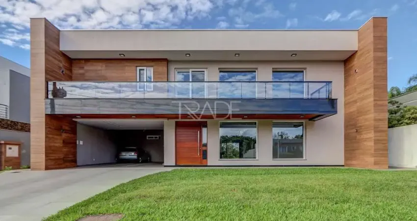 Casa em condomínio fechado com 5 quartos à venda na Avenida Juca Batista, 8000, Belém Novo, Porto Alegre
