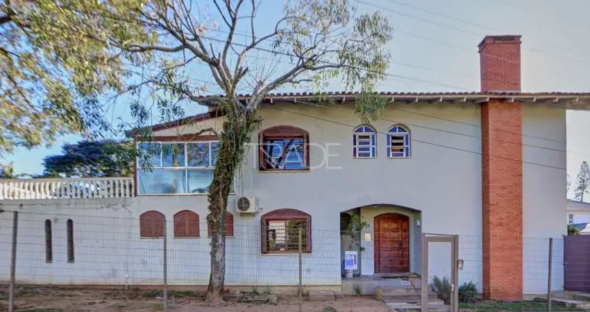 Casa com 3 quartos à venda na Rua Burum, 30, Vila Assunção, Porto Alegre