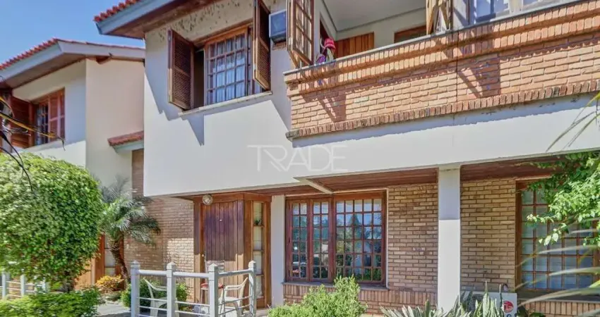 Casa em condomínio fechado com 3 quartos à venda na Avenida da Cavalhada, 6021, Cavalhada, Porto Alegre