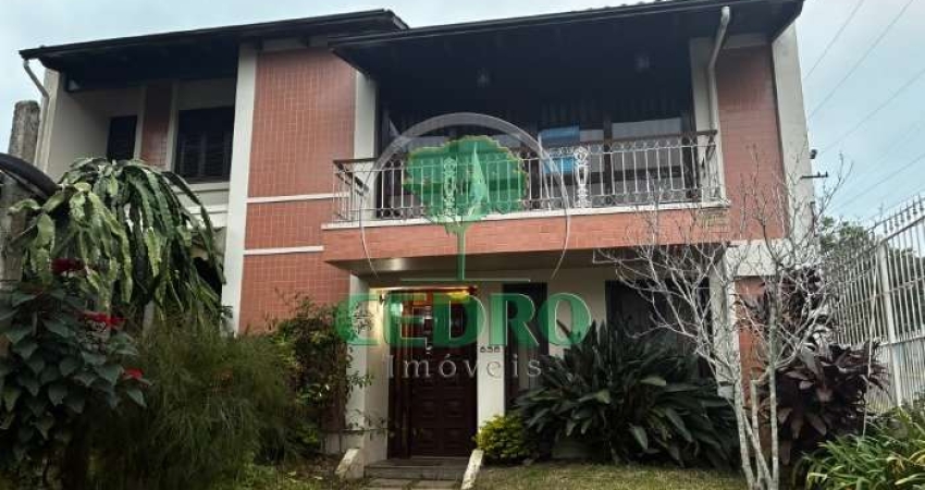 Casa com 4 quartos à venda na Rua Upamaroti, 836, Cristal, Porto Alegre