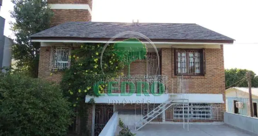 Casa com 3 quartos à venda na Rua Delfino Riet, 287, Santo Antônio, Porto Alegre