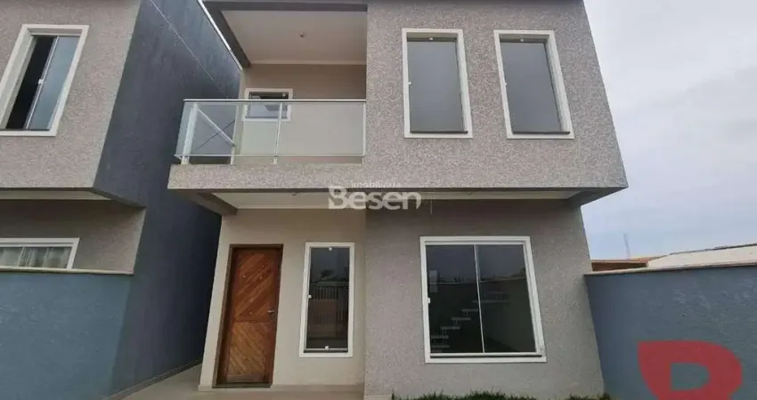 Sobrado novo com  ótimo padrão de acabamento, medindo 96,34m², próximo ao centro comercial da cidade.