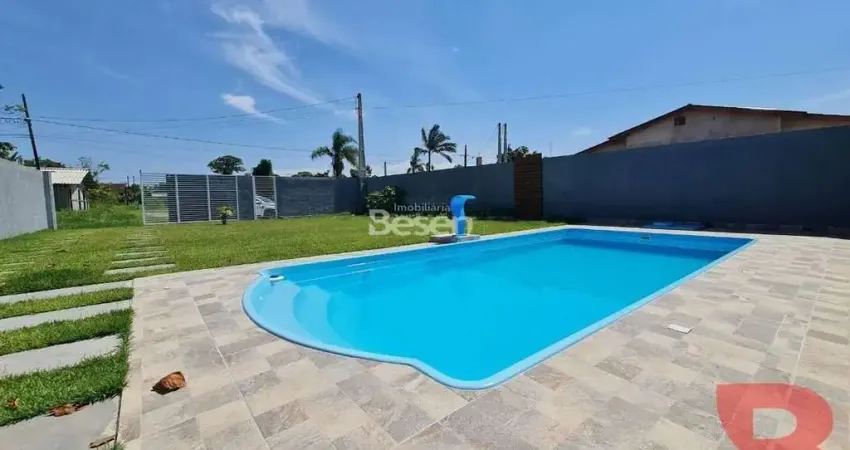 Excelente imóvel contendo 05 dormitórios (sendo 01 suíte) com piscina.