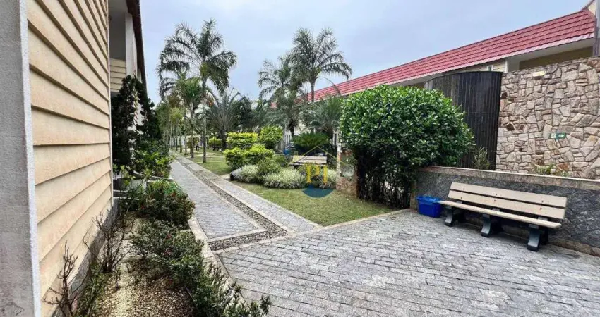 Sobrado com 3 dormitórios à venda, 152 m² por R$ 1.011.298,77 - Mirim - Praia Grande/SP