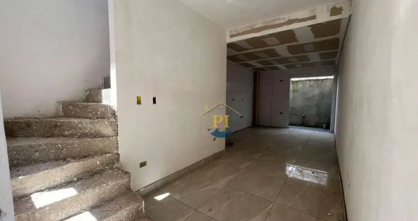 Casa com 2 dormitórios à venda, 57 m² por R$ 400.000,00 - Vila Guilhermina - Praia Grande/SP