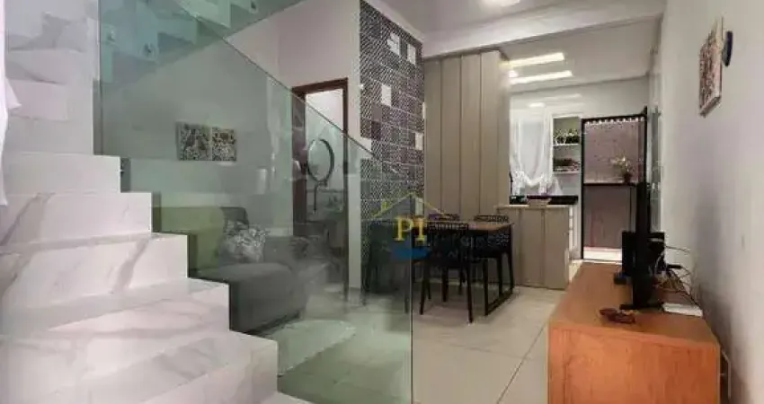 Casa com 2 dormitórios à venda, 60 m² por R$ 385.000,00 - Maracanã - Praia Grande/SP