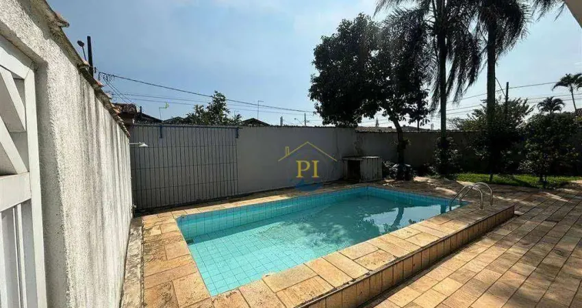 Casa com 3 dormitórios à venda, 100 m² por R$ 900.000 - Maracanã - Praia Grande/SP