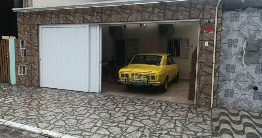 Casa com 2 dormitórios à venda, 80 m² por R$ 450.000 - Vila Guilhermina - Praia Grande/SP