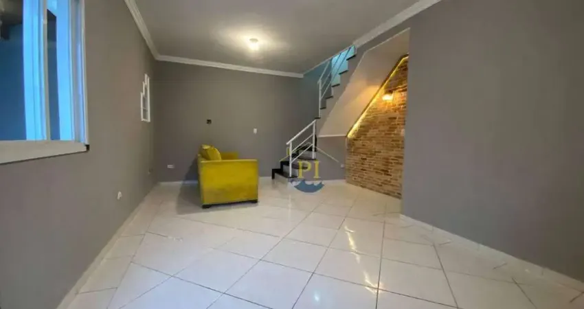 Sobrado com 3 dormitórios à venda, 110 m² por R$ 770.000 - Boqueirão - Praia Grande/SP