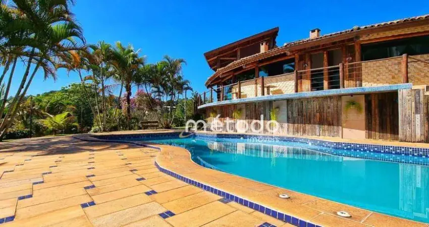 Casa com 5 dormitórios à venda, 560 m² por R$ 3.500.000,00 - Condomínio Residencial Alpes de Guararema - Guararema/SP