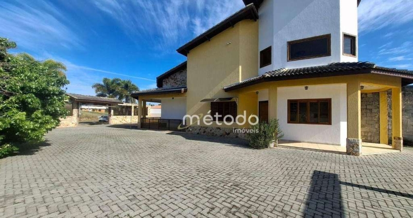 Casa com 3 dormitórios para alugar, 300 m² por R$ 9.596/mês - Condomínio Lago Dourado - Jacareí/SP