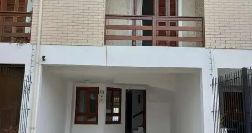 Casa com 3 dormitórios para alugar, 190 m² por R$ 3.632/mês - Guarujá - Porto Al