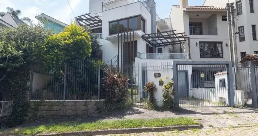 Casa com 5 dormitórios para alugar, 303 m² por R$ 7.974/mês - Ipanema - Porto Al