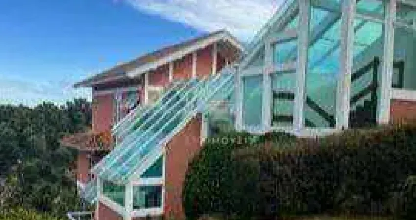 Casa com 4 dormitórios à venda, 700 m² por R$ 3.750.000 - Jardim Véu da Noiva - Campos do Jordão/SP