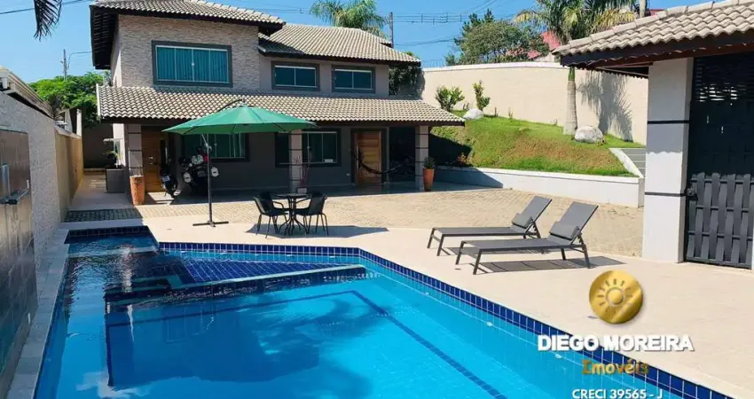 Casa À venda em Terra Preta com 3 dormitórios, suíte com hidromassagem.
